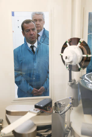 FILE PHOTO: Russian Prime Minister Dmitry Medvedev visits a plant of Russian microchip company Angstrem-T in Zelenograd near Moscow, Russia August 3, 2016. Sputnik/Dmitry Astakhov/Pool via REUTERS