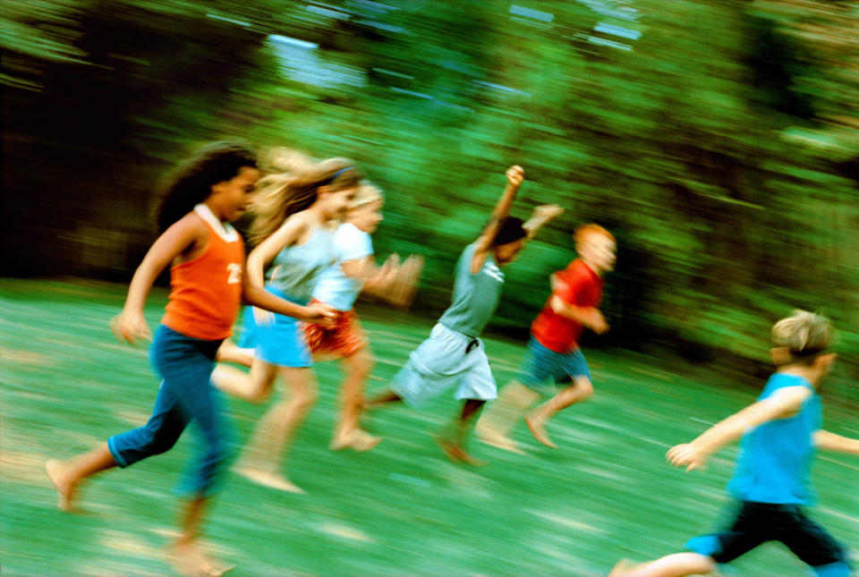 Children running on grass