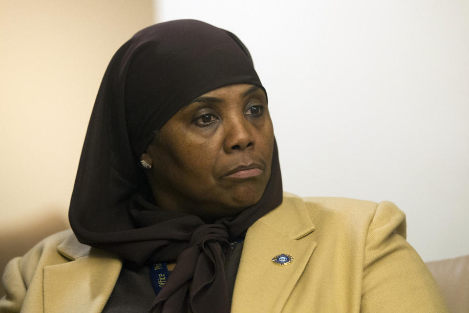 In this Jan. 9, 2018 photo, Movita Johnson-Harrell, Interim Supervisor of Victim Services, looks on after getting introduced, during a press conference at the District Attorney's Office in Philadelphia. Johnson-Harrell, the first female Muslim member of the Pennsylvania House of Representatives, said Tuesday, March 26, 2019, she was offended by a colleague's decision to open a voting session with a prayer a day earlier that "at the name of Jesus every knee will bow." (Jose F/Moreno/The Philadelphia Inquirer via AP)