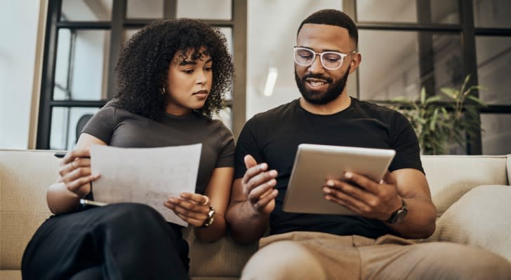 Couple discussing what investments will help their retirement