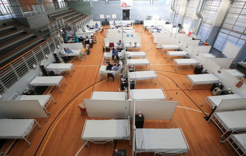 FILE PHOTO: Beds are seen at a temporary field hospital set up by Medecins Sans Frontieres (MSF) during the coronavirus disease (COVID-19) outbreak in Khayelitsha township near Cape Town