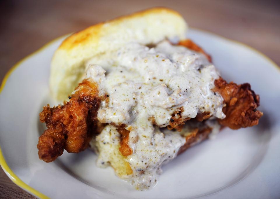 The East Nasty put Biscuit Love on the map. It is a fried chicken thigh, aged cheddar and sausage gravy on biscuit.
