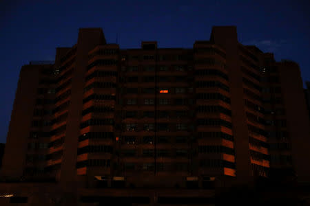 A view of a building during a second day of blackout in Caracas, Venezuela March 9, 2019. REUTERS/Marco Bello