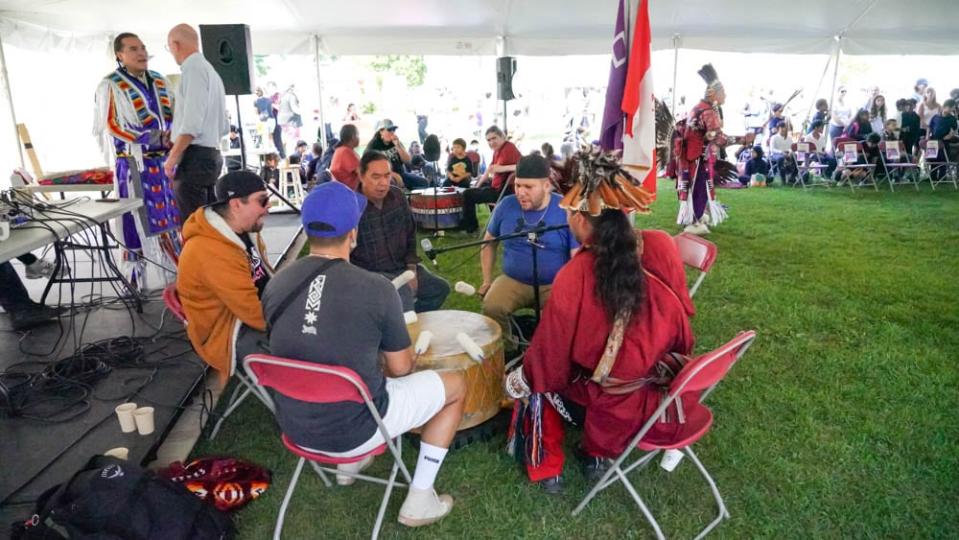 A group of Indigenous men sing around a traditional drum during the Otsenhákta Student Centre Pow Wow on Sept 13, at Loyola Campus Quad Space.