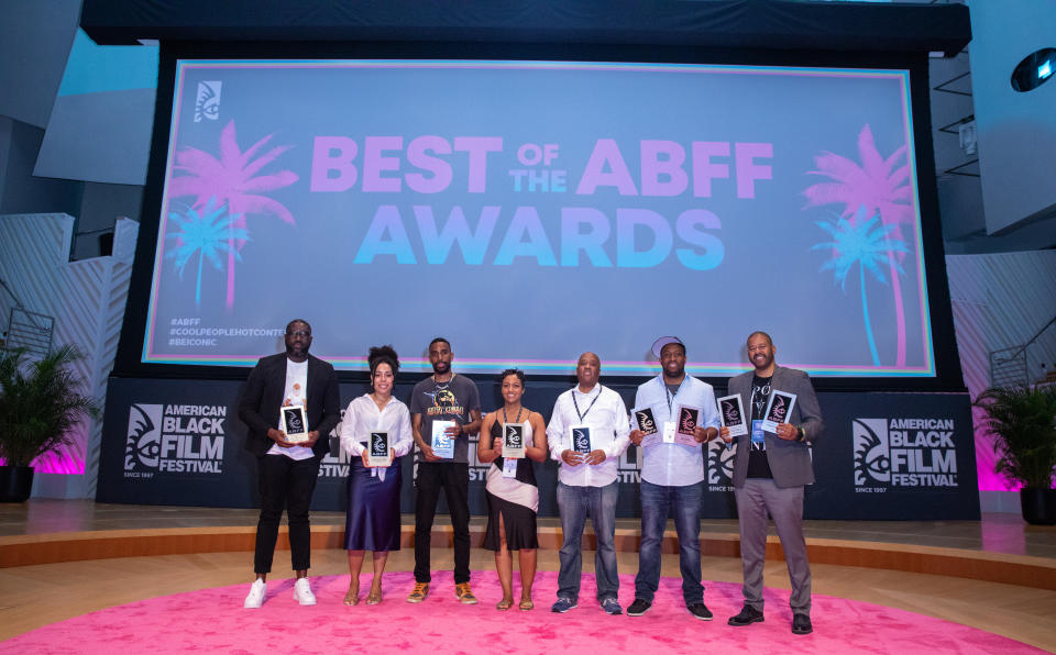 ABFF award winners Sherife Alabede (“Another Country”), Diara Newman (“Townhall”), Deion Higginbotham (“The Saints”), Amira Smith (“A Woman on the Outside”; Smith accepting for filmmaking team Kiara C. Jones and Zara Katz and Lisa Riordan Seville), Randall Dottin (“Mine”), Kali Baker-Johnson (“Feel Like Ghosts”) and Roy Clovis Jr. (accepting on behalf of “Our Father, The Devil” filmmaker Ellie Foumbi). - Credit: ABFF/Eric Ellis