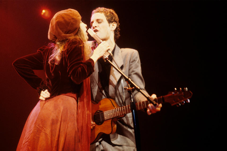 <p>After Fritz disbanded, Nicks and Buckingham formed a duo, Buckingham/Nicks, though the pair didn't find success on their own. On Dec. 31 1974, Mick Fleetwood of Fleetwood Mac called Buckingham, hoping to convince him to play guitar for the band, but Buckingham <a href="https://people.com/music/lindsey-buckingham-christine-mcvie-duets-album-early-fleetwood-mac-interview/" rel="nofollow noopener" target="_blank" data-ylk="slk:insisted Nicks join as well;elm:context_link;itc:0;sec:content-canvas" class="link ">insisted Nicks join as well</a>.</p> <p>Buckingham told PEOPLE in 2017, "Mick called me—he had heard my guitar playing and then a couple of weeks later [guitarist] Bob Welch decided he was going to leave the band. Mick actually asked me to join first, and I said, 'Well, you've gotta take my girlfriend too.' And he says, 'I'll get back to you on that.' </p>