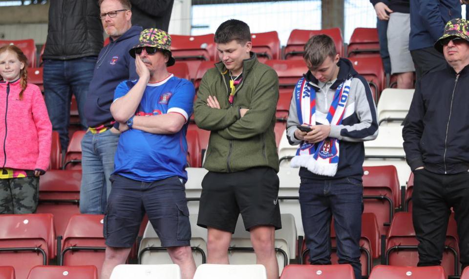 News and Star: Carlisle fans look downcast as the Blues are relegated at Northampton