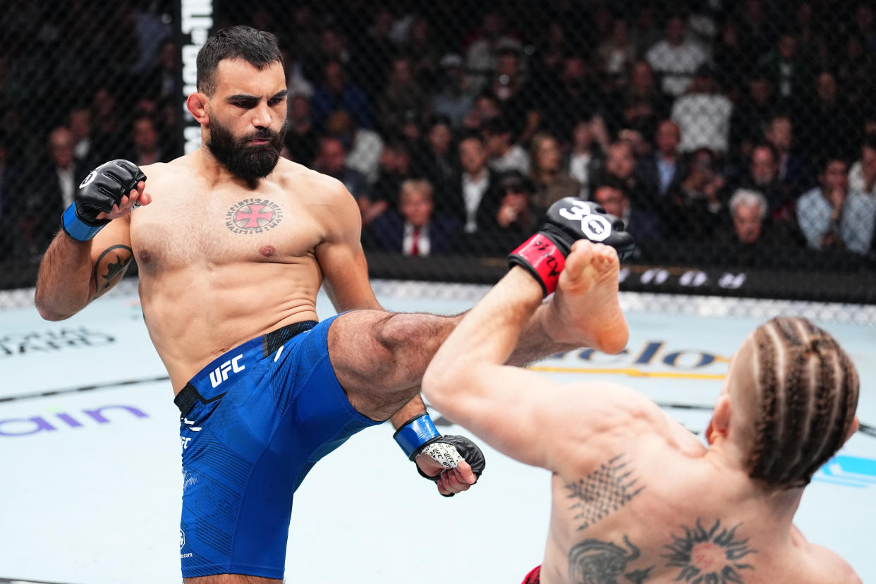 NEW YORK, NEW YORK - NOVEMBER 11: Benoit Saint Denis of France kicks Matt Frevola in a lightweight fight during the UFC 295 event at Madison Square Garden on November 11, 2023 in New York City. (Photo by Chris Unger/Zuffa LLC via Getty Images)