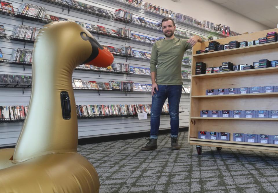 Owner Ethan Symonds recently opened Duck Duck Games, a store in Munroe Falls that specializes in buying, selling and trading games, consoles and collectibles.