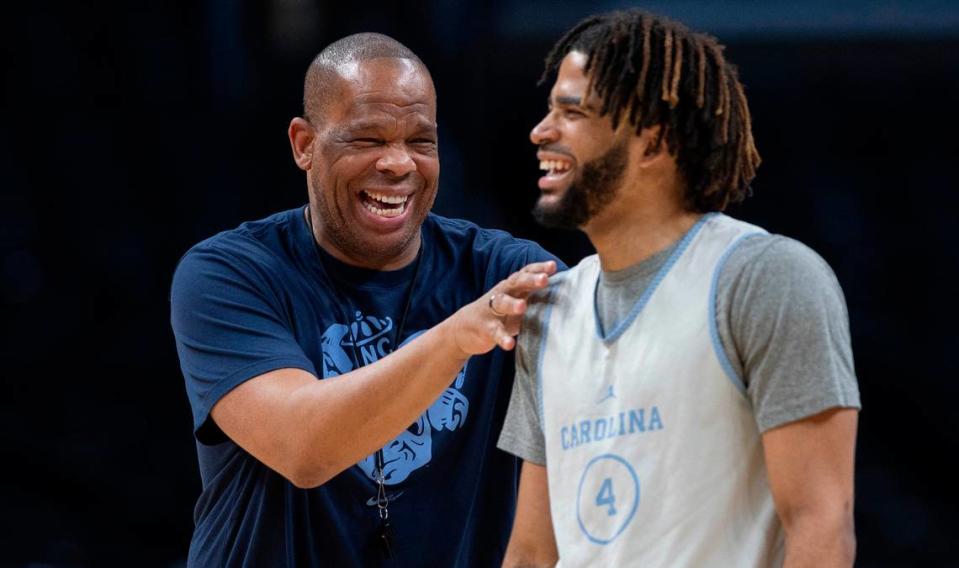 North Carolina coach Hubert Davis laughs with R.J. Davis (4) during the Tar Heels’ practice on Wednesday, March 27, 2024 at Crypto.com Arena in Los Angeles, CA. North Carolina will face Alabama in the NCAA Sweet Sixteen on Thursday.