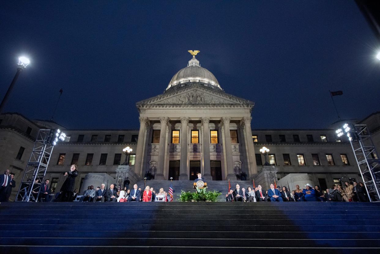 Gov. Tate Reeves delivers the State of the State address on the south steps of the Mississippi State Capitol on Monday evening.