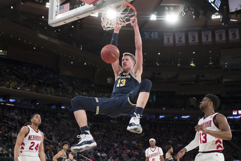 Michigan forward Moritz Wagner, of Germany, dunks during the first half of an NCAA college basketball game against Nebraska in the quarterfinals of the Big Ten conference tournament, Friday, March 2, 2018, at Madison Square Garden in New York. (AP Photo/Mary Altaffer)