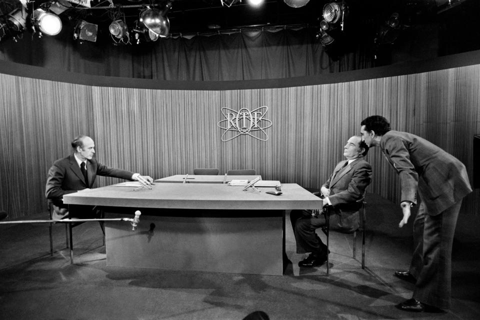 Giscard, left, and the Socialist Party leader Francois Mitterrand before a radio and televised campaign debate in 1974 - AFP/Getty