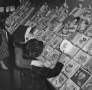 <p>In the mid-50s, little girls shop for the perfect Valentine's Day greeting cards. </p>