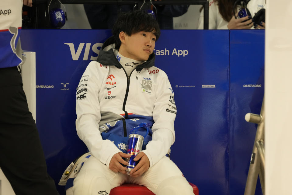 Yuki Tsunoda of Japan, driver of RB, the team previously known as AlphaTauri waits in the garage before the second free practice session at the Suzuka Circuit in Suzuka, central Japan, Friday, April 5, 2024, ahead of Sunday's Japanese Formula One Grand Prix. About two dozen Japanese drivers have raced in Formula 1 over almost 50 years, and success has been limited. (AP Photo/Hiro Komae)