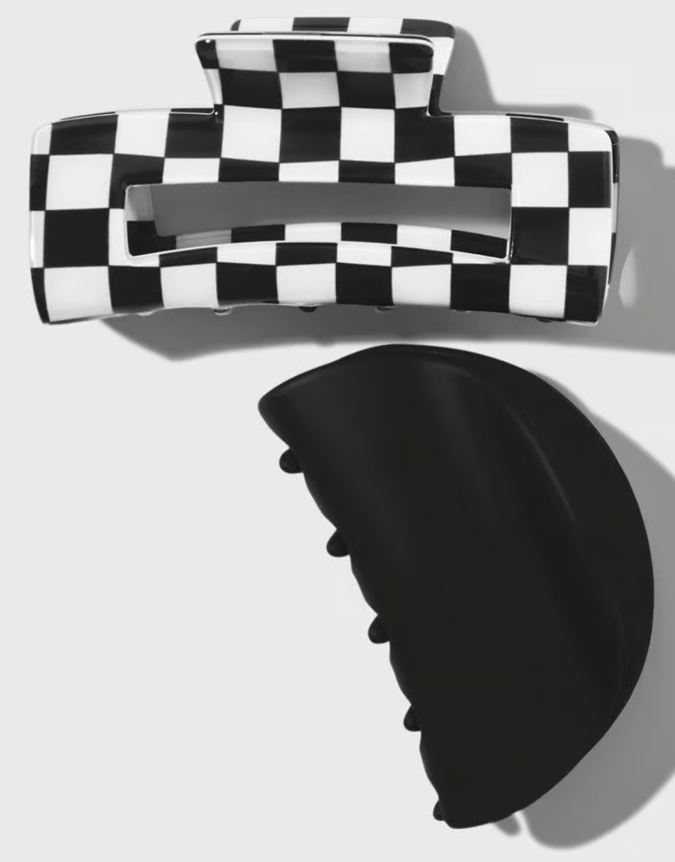 black claw clip next to black and white checkered claw clip