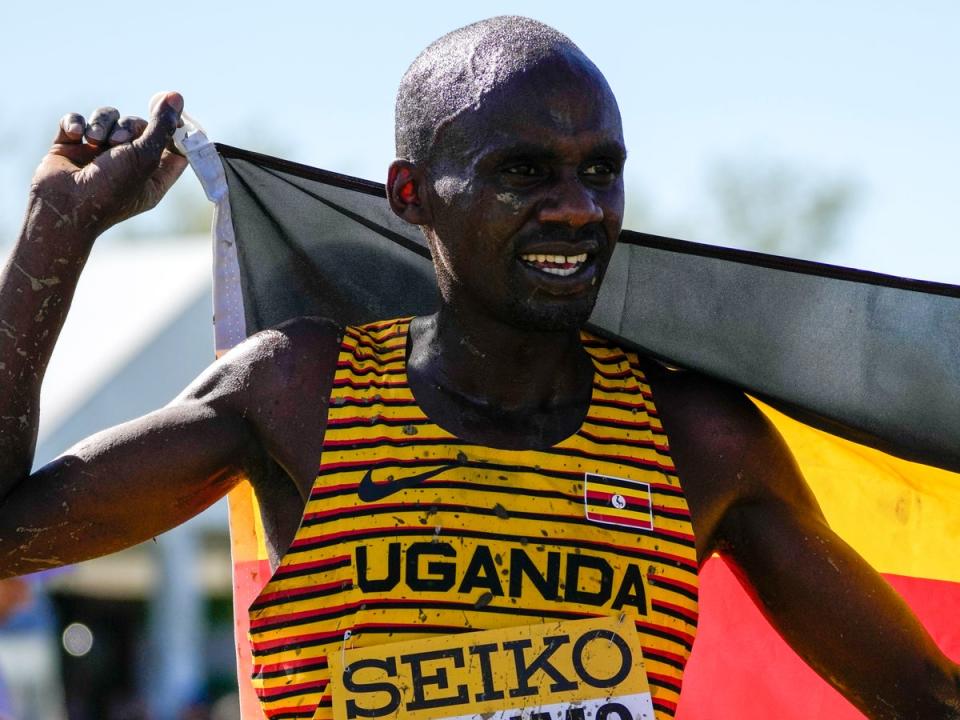 Jacob Kiplimo of Uganda celebrates as he won the men's senior race during the World Athletics Cross Country Championships in Belgrade, Serbia (AP)