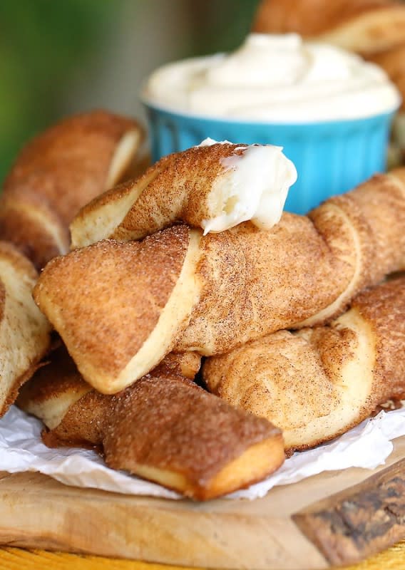 <p>Copycat Cinnabon Cinnamon Stix are the perfect brunch item. Utterly cinnamon-sugar coated heaven! Served with homemade Cinnabon's rich cream cheese frosting. It doesn't get much better than that!</p><p><strong>Get the recipe: <a href="http://www.theslowroasteditalian.com/2014/05/copycat-cinnabon-cinnamon-stix-recipe.html" rel="nofollow noopener" target="_blank" data-ylk="slk:Copycat Cinnabon Cinnamon Stix;elm:context_link;itc:0;sec:content-canvas" class="link rapid-noclick-resp">Copycat Cinnabon Cinnamon Stix</a></strong></p>