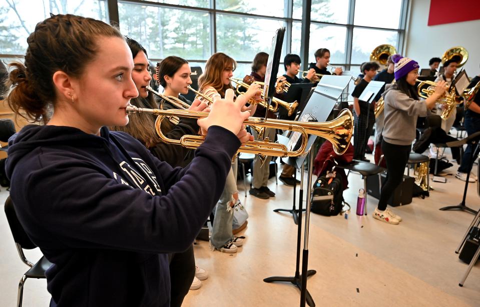 Trumpeter Emma Robeau and the South High band rehearse in preparation for the Worcester County St. Patrick's Parade.