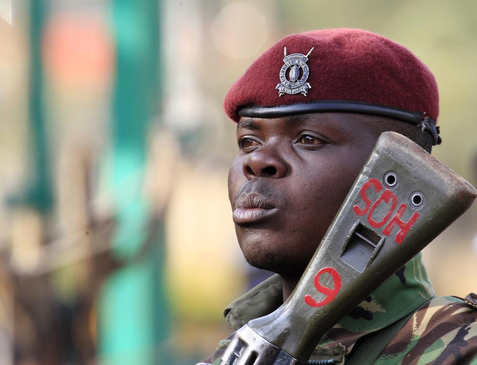 A Kenya General Service Unit policeman stands guard in the area around Westgate shopping mall in Nairobi