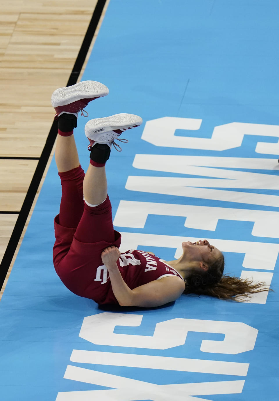 Indiana guard Ali Patberg (14) celebrates a play against North Carolina State during the second half of a college basketball game in the Sweet Sixteen round of the women's NCAA tournament at the Alamodome in San Antonio, Saturday, March 27, 2021. (AP Photo/Eric Gay)