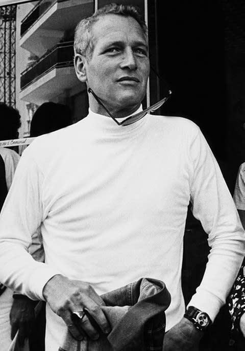 Newman sporting the watch at the Cannes film festival in 1973 with his wife Joanne Woodward, who gave it to him - Credit: Keystone-France/Getty