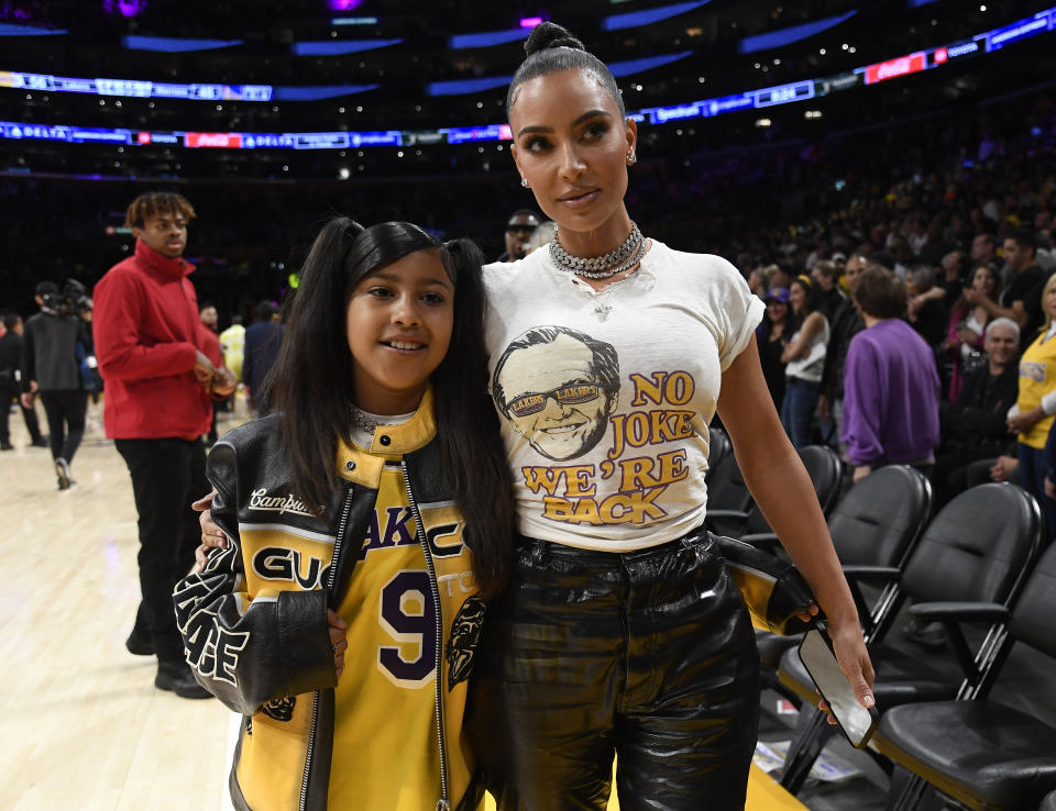 LOS ANGELES, CALIFORNIA - MAY 12: Kim Kardashian and daughter North West attend the Western Conference Semifinal Playoff game between the Los Angeles Lakers and Golden State Warriors at Crypto.com Arena on May 12, 2023 in Los Angeles, California. (Photo by Kevork Djansezian/Getty Images)