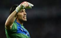 Italian goalkeeper Gianluigi Buffon reacts during the penalty shoot out of the Euro 2012 football championships quarter-final match England vs Italy at the Olympic Stadium in Kiev. Italy won 4 to 2