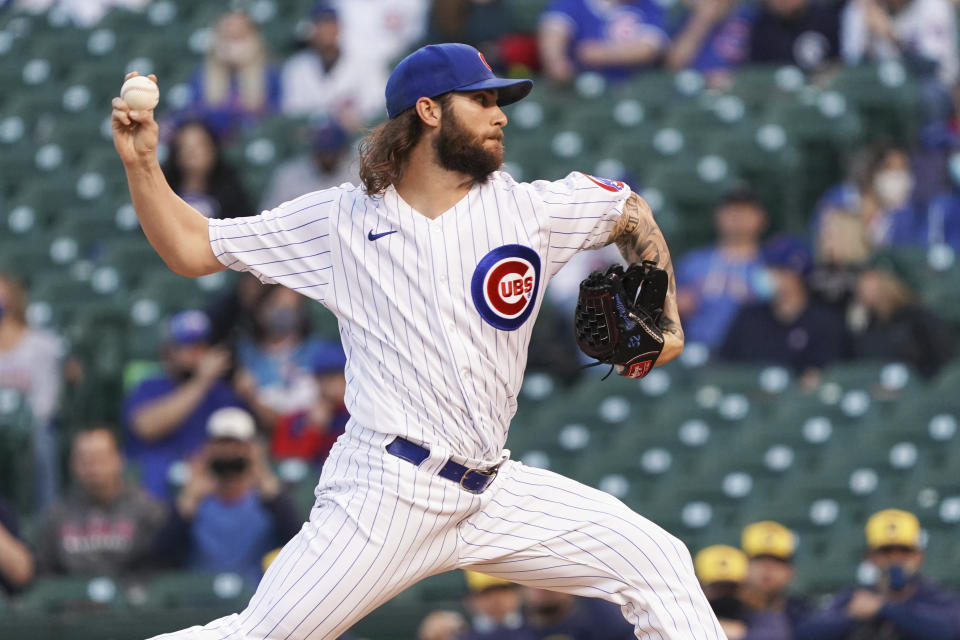 Chicago Cubs starting pitcher Trevor Williams (32) throws against the Milwaukee Brewers during the first inning of a baseball game, Monday, April, 5, 2021, in Chicago. (AP Photo/David Banks)