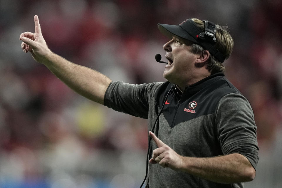Georgia head coach Kirby Smart speaks from the sidelines during the first half of the Peach Bowl NCAA college football semifinal playoff game against Georgia, Saturday, Dec. 31, 2022, in Atlanta. (AP Photo/Brynn Anderson)