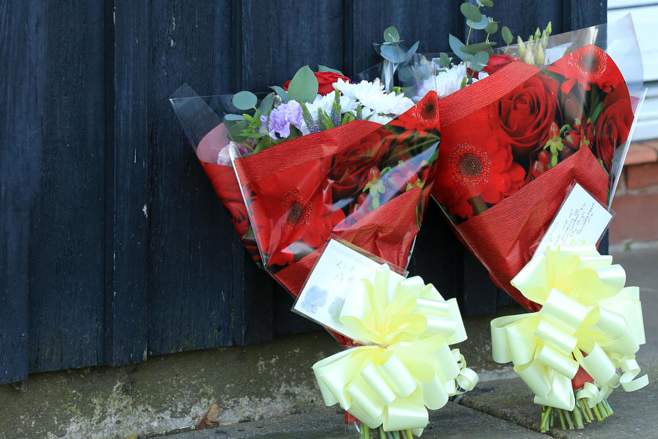 Handout photo of floral tributes near a property in Bosworth Road, Adwick, Doncaster, after two-year-old Keigan Ronnie O'Brien died in hospital after being found in cardiac arrest at the property on Wednesday (PA)