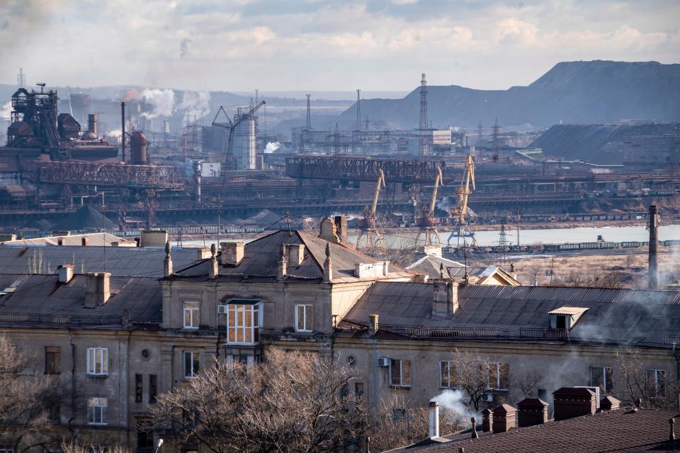 A slag heap at the Azovstal Steel and Iron Works facility operated by Metinvest Group, a unit of SCM Holdings, beyond housing in Mariupol, Ukraine, on Saturday, Jan. 15, 2022