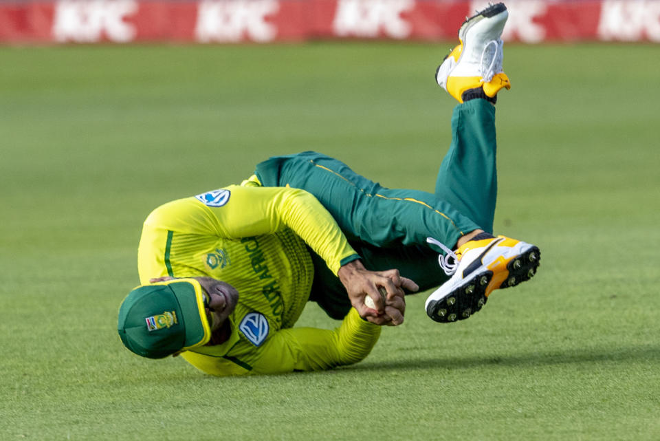 South Africa's Faf du Plessis takes a catch to dismiss Australia's batsman Steven Smith for 29 runs during the 2nd T20 cricket match between South Africa and Australia at St George's Park in Port Elizabeth, South Africa, Sunday, Feb. 23, 2020. (AP Photo/Themba Hadebe)