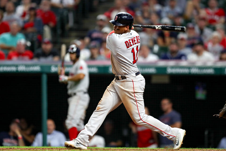 CLEVELAND, OH - AUGUST 13: Boston Red Sox third baseman Rafael Devers (11) hits his fourth double of the game during the tenth inning of the Major League Baseball game between the Boston Red Sox and Cleveland Indians on August 13, 2019, at Progressive Field in Cleveland, OH. (Photo by Frank Jansky/Icon Sportswire via Getty Images)