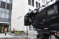 Media are seen outside the main entrance of St. Bartholomew's Hospital where Britain's Prince Philip is being treated, in London, Thursday, March 4, 2021. Buckingham Palace said Thursday that Prince Philip has undergone a successful procedure for a pre-existing heart condition, and will remain in hospital "for a number of days." (AP Photo/Alberto Pezzali)