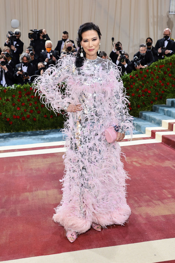 Wendi Murdoch wears a feathery-looking dress