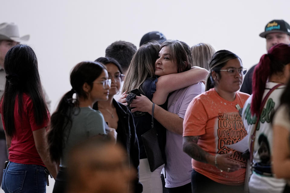 Family members arrive for a special city council meeting in Uvalde, Texas, Thursday, March 7, 2024. Almost two years after the deadly school shooting in Uvalde that left 19 children and two teachers dead, the city council met to discuss the results of an independent investigation it requested into the response by local police officers. (AP Photo/Eric Gay)