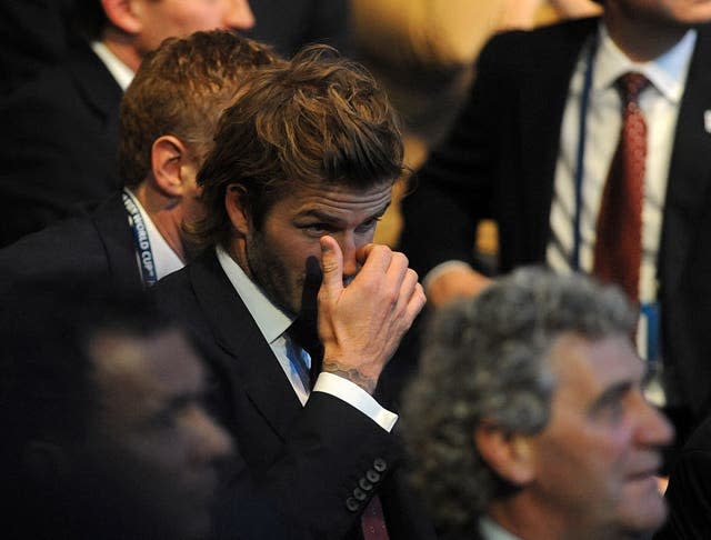 David Beckham looks on in disappointment as England's bid for the 2018 World Cup was overlooked