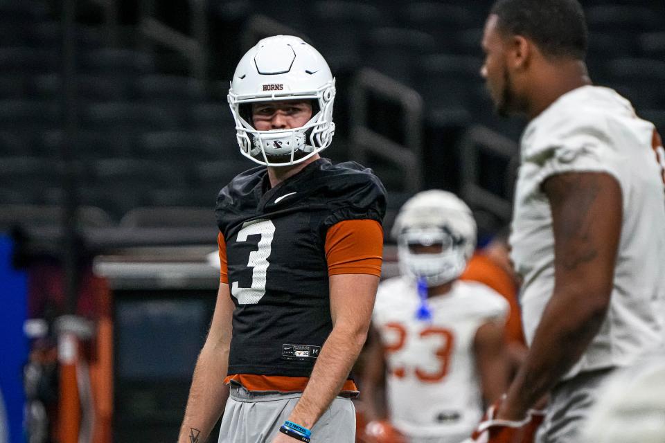 Texas Longhorns quarterback Quinn Ewers (3) practices at the Superdome on Saturday, Dec. 30, 2023 in New Orleans, Louisiana. The Texas Longhorns will take on the Washington Huskies in the College Football Playoff Semi-Finals on January 1, 2024.
