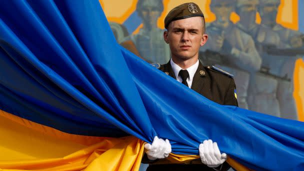 PHOTO: A member of the military attends a flag-raising ceremony at Hetman Petro Sahaidachny National Ground Forces Academy on Aug. 23, 2022, in Lviv, Ukraine. (Jeff J Mitchell/Getty Images)