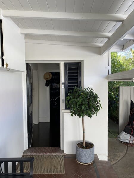 Long narrow with dark floors and low ceilings, the original bungalow's core was devoid of light.