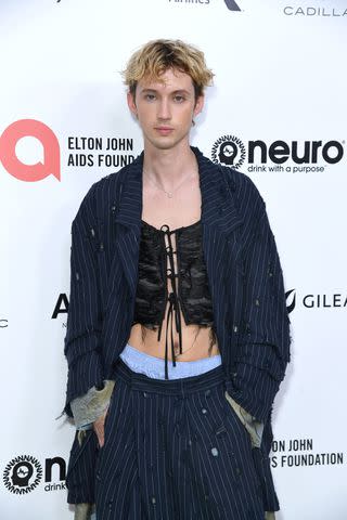 <p>JC Olivera/WireImage</p> Troye Sivan attends the Elton John AIDS Foundation's 31st Annual Academy Awards Viewing Party on March 12, 2023 in West Hollywood, California.