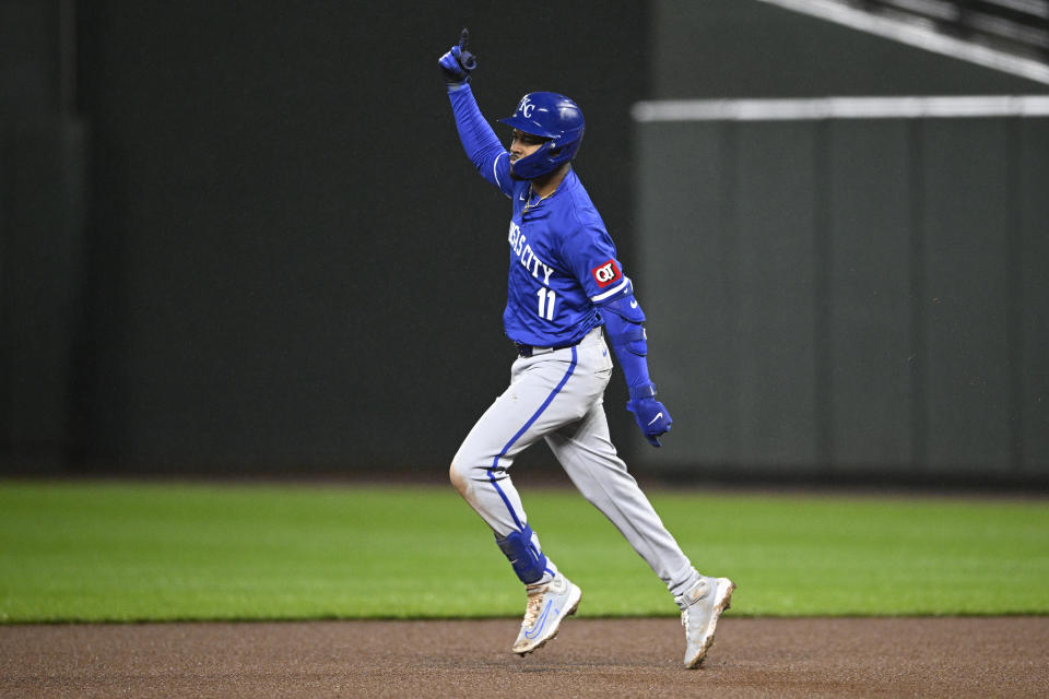 Kansas City Royals' Maikel Garcia celebrates as he runs the bases on a home run during the seventh inning of the team's baseball game against the Baltimore Orioles, Wednesday, April 3, 2024, in Baltimore. (AP Photo/Nick Wass)