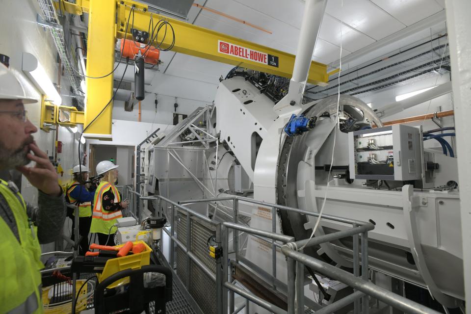 Only a small portion of the proton beam machine is visible to patients - behind a wall is the gantry, which gets the beam from the cyclotron to the patient.