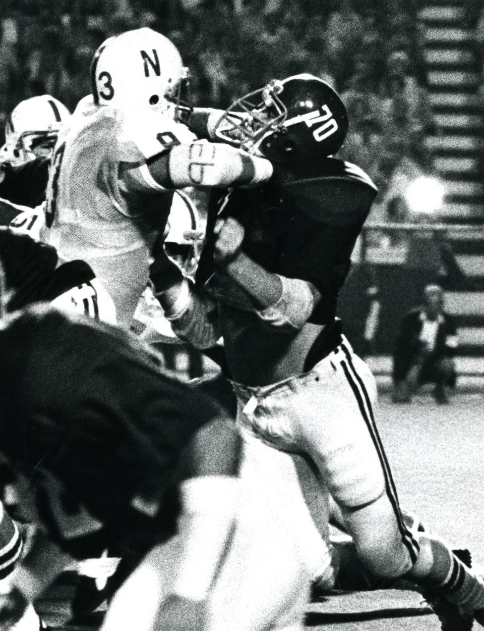 Mike Brock (70) blocks during an Alabama football game.
