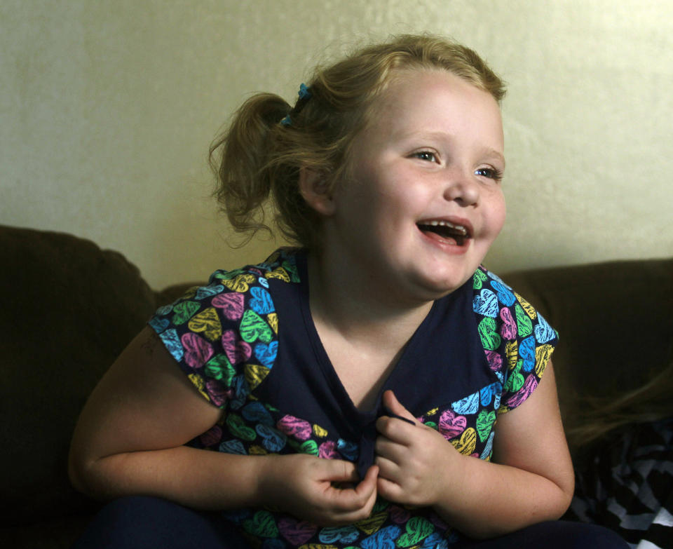 FILE - Beauty pageant regular and reality show star Alana "Honey Boo Boo" Thompson, 7, appears during an interview in her home in McIntyre, Ga., on Sept. 10, 2012. Thompson starred in TLC's "Here Comes Honey Boo Boo." (AP Photo/John Bazemore, File)