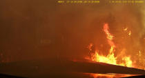 <p>Smoke covers the road as wildfire burns in Hammonds Plains, Nova Scotia, Canada, May 28, 2023 in this screengrab obtained from a social media video. Instagram@alka.films/via REUTERS THIS IMAGE HAS BEEN SUPPLIED BY A THIRD PARTY. MANDATORY CREDIT.</p> 