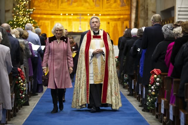 The Duchess pictured leaving the carol service with the Reverend Stephen Dunwoody, Chaplain to the Household Division. Heathcliff O’Malley/Daily Telegraph