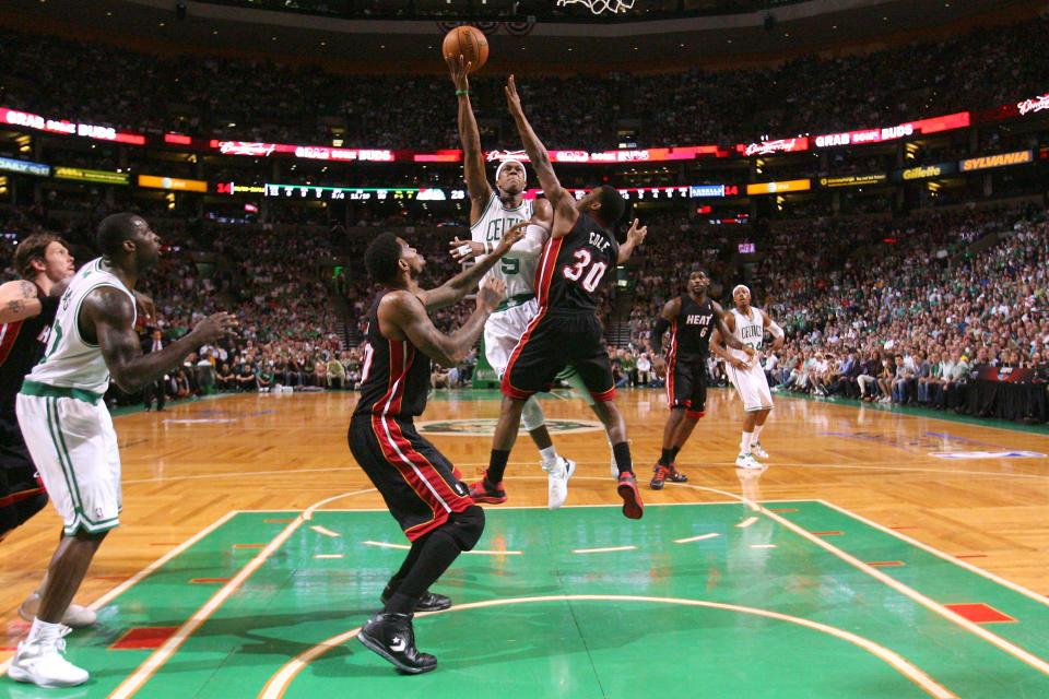 BOSTON, MA - JUNE 03: Rajon Rondo #9 of the Boston Celtics attempts a shot in the first quarter against Norris Cole #30 of the Miami Heat in Game Four of the Eastern Conference Finals in the 2012 NBA Playoffs on June 3, 2012 at TD Garden in Boston, Massachusetts. (Photo by Jim Rogash/Getty Images)