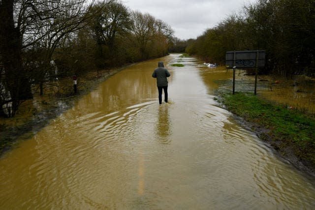 A flooded Broome Lane in East Goscote, Leicestershire (Jacob King/PA)